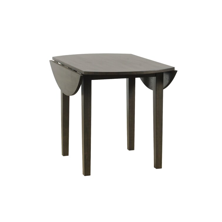 Dutra extendable outlet dining table